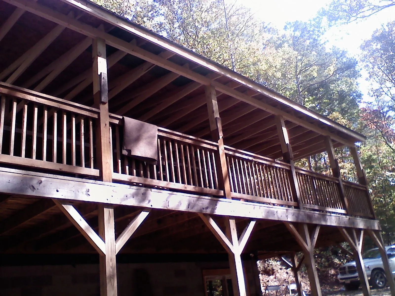 Timber framing under a new elevated porch and deck — Roof Leak Repair in Scott Depot by Roofing Brothers